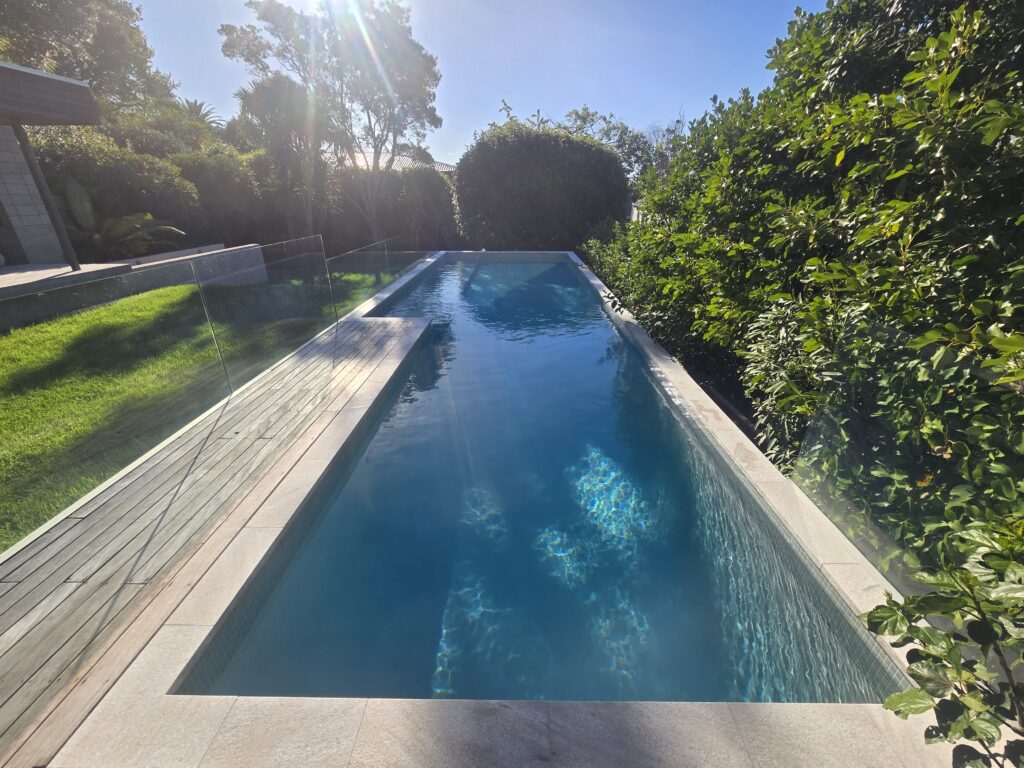 Pool renovation in Westmere Auckland with Ezarri Peridot glass mosaic tiling