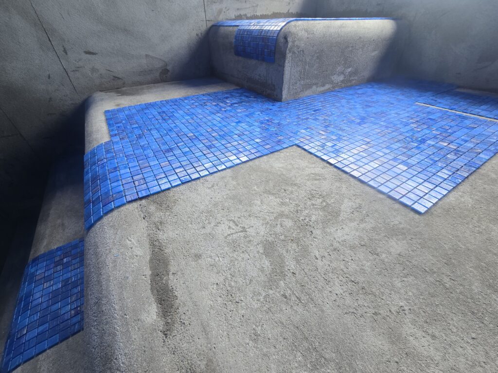 Completed pool renovation in Coatsville Auckland after resurfacing and retiling