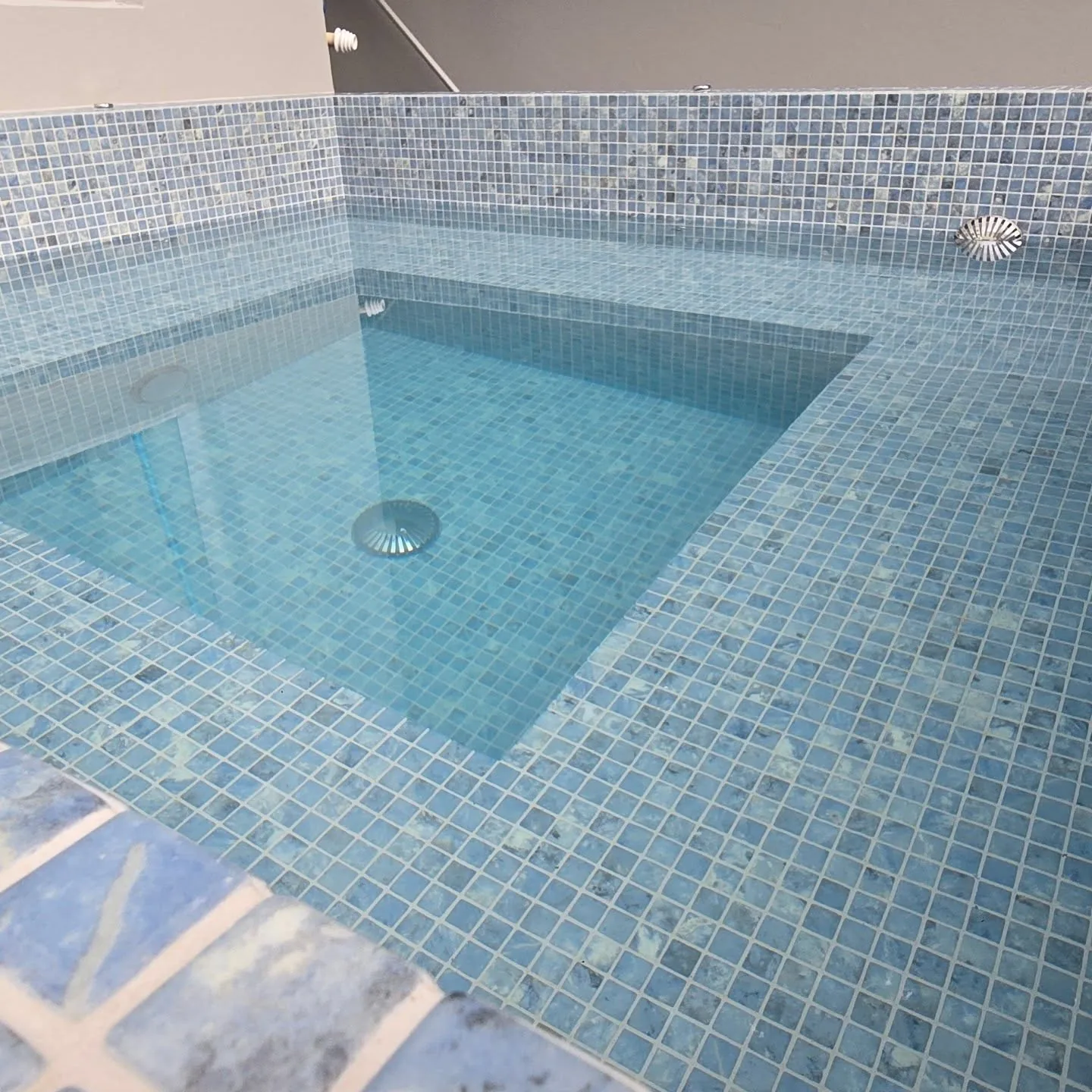 Bisazza glass mosaic tiles in a fully tiled Remuera spa